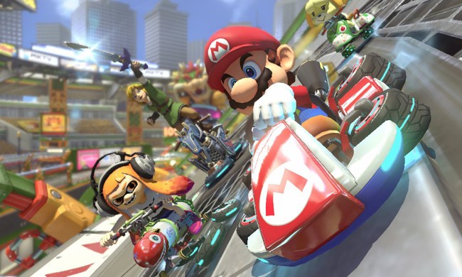 Mario, Link, Isabelle, and a Squid Kid race down the track in Mario Kart 8 Deluxe for the Nintendo Switch.
