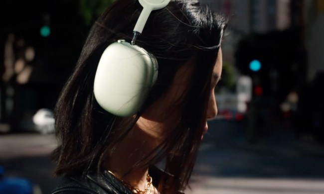 A woman wearing the Apple AirPods Max.