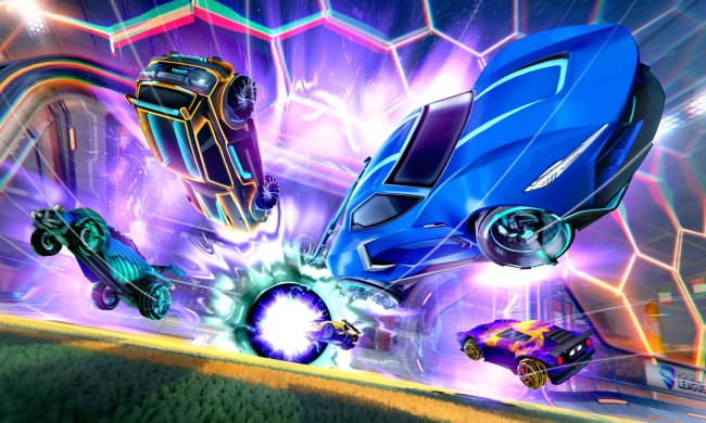 Cars fly off and away from a goal explosion in Rocket League.