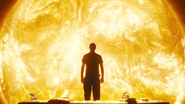 A man standing in front of the sun in Sunshine