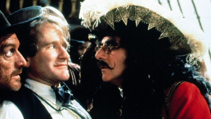 Captain Hook stares into the eyes of Peter Pan.