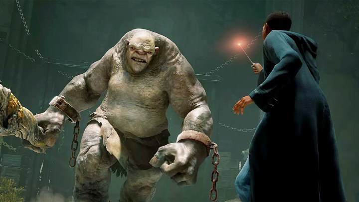 Wizard facing a troll in Hogwarts Legacy.