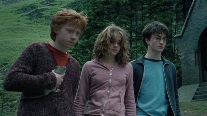 Ron, Hermione, and Harry looking down in Harry Potter and the Prisoner of Azkaban