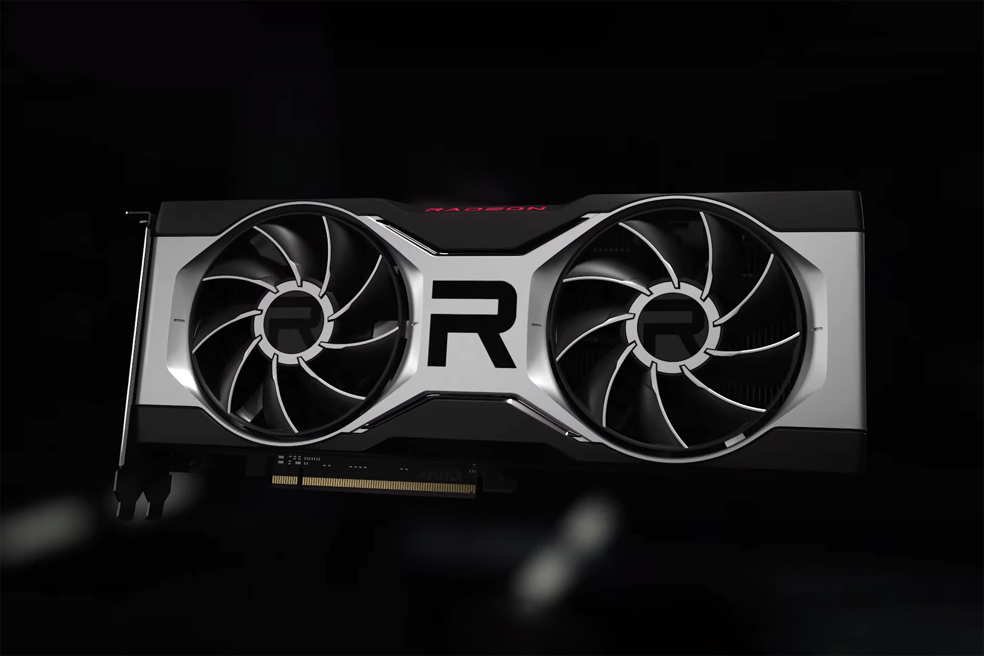 Uma placa de vídeo AMD Radeon RX 6700 XT colocada na frente de um fundo preto.