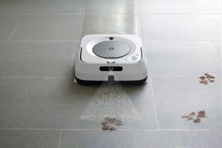 The iRobot Braava Jet M6 robot mop cleaning paw prints.