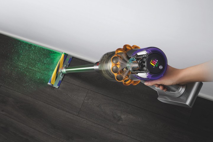 The Dyson V15 Detect cordless vacuum with its laser.