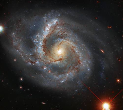 This image taken with the NASA/ESA Hubble Space Telescope features NGC 7678 – a galaxy with one particularly prominent arm, located approximately 164 million light-years away in the constellation of Pegasus (the Winged Horse). With a diameter of around 115,000 light-years, this bright spiral galaxy is a similar size to our own galaxy (the Milky Way) and was discovered in 1784 by the German-British astronomer William Herschel.
