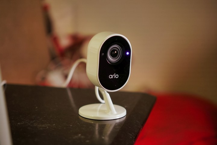 Arlo Essential indoor security camera on the nightstand