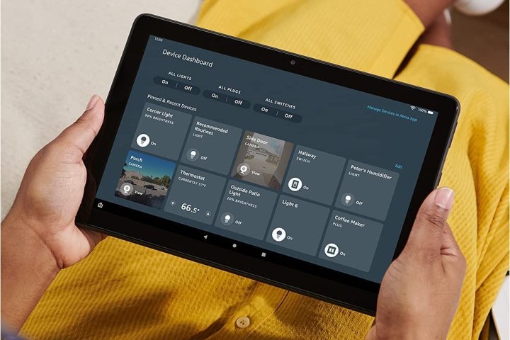 The Amazon Fire HD 10 Plus tablet, with apps on the screen.