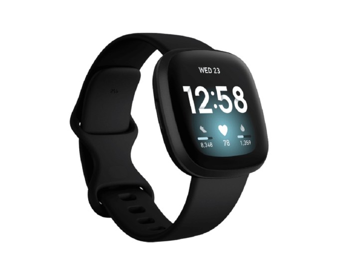 A Fitbit Versa 3 displays the time.