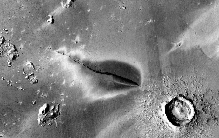 Recent explosive volcanic deposit around a fissure of the Cerberus Fossae system. 