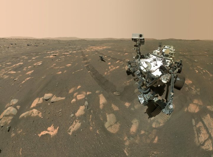 NASA’s Perseverance Mars rover took a selfie with the Ingenuity helicopter, seen here about 13 feet (3.9 meters) from the rover. This image was taken by the WASTON camera on the rover’s robotic arm on April 6, 2021, the 46th Martian day, or sol, of the mission.
