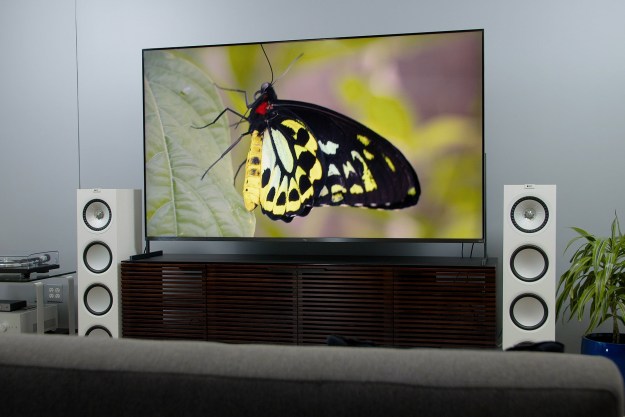 The TCL 85R745 85-inch 4K HDR TV in a living room.
