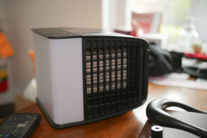 EVAPOLA portable AC unit on top of table.