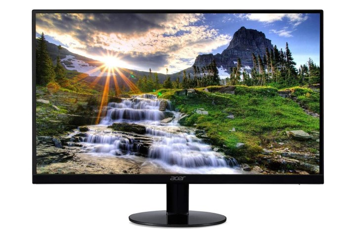 A turned on Acer SB220Q FHD IPS Widescreen monitor facing forward and displaying a desktop background of a nature scene.