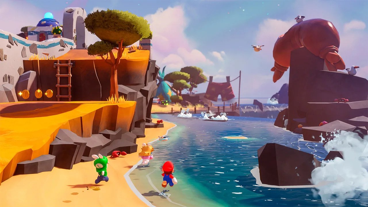 Mario, Rabbid Peach e Rabbid Luigi exploram uma praia em Mario + Rabbids: Sparks of Hope.