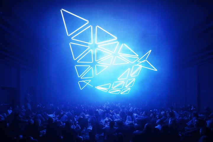 An overhead LED display at a concert.