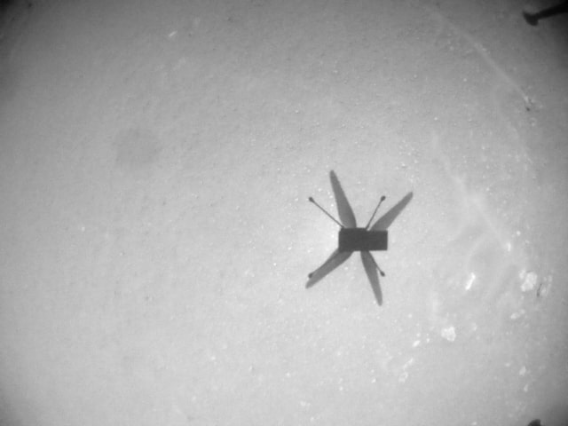 NASA’s Ingenuity Mars Helicopter acquired this image on May 22, 2021 using its black and white navigation camera. This camera is mounted in the helicopter’s fuselage and pointed directly downward to track the ground during flight.