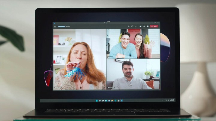 A video call in Microsoft Teams is displayed on a laptop.