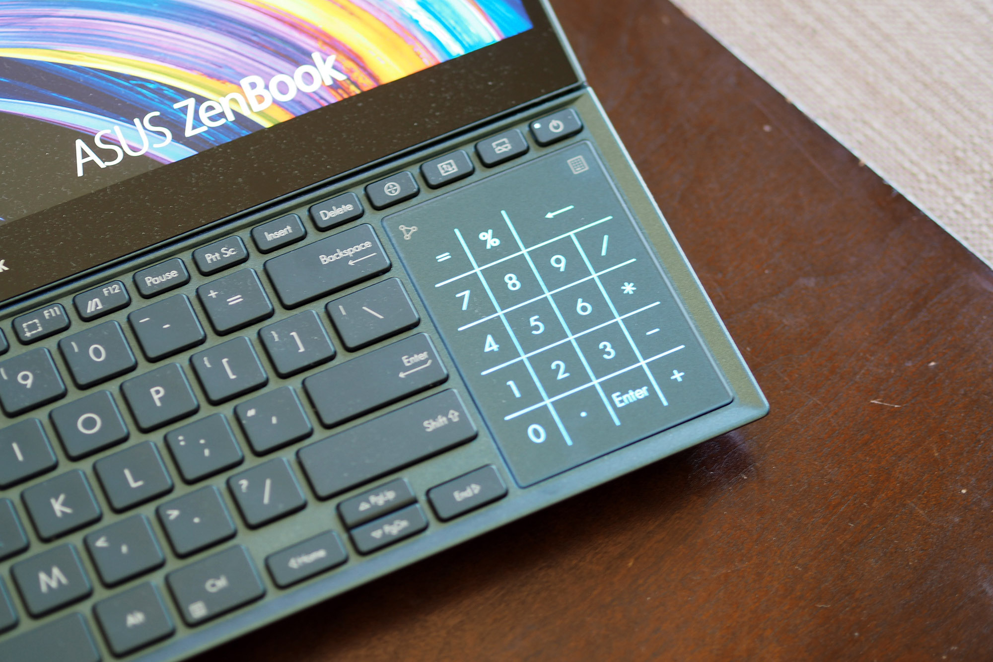 Close up on Asus ZenBook Pro Duo 15's vertical touchpad.