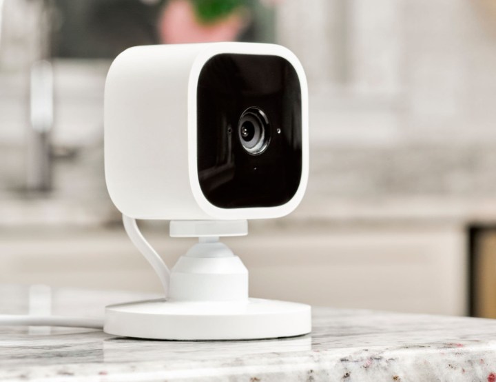 Blink Mini Corded Indoor 1080p Security Camera sitting on a granite countertop.