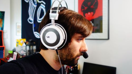A man wearing the VZR Model One headphones.