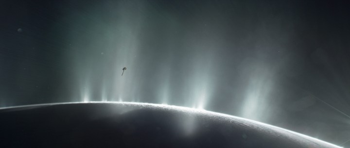 An artist's impression depicts NASA's Cassini spacecraft flying through a plume of presumed water erupting from the surface of Saturn's moon Enceladus. 