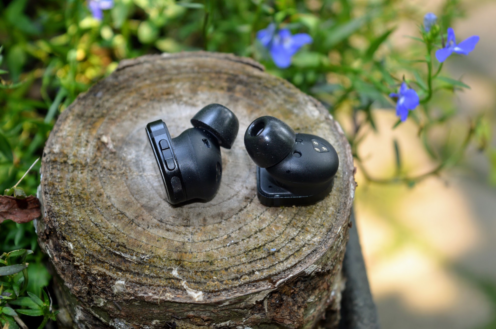 Master & Dynamic MW08 Sport true wireless earbuds close-up.