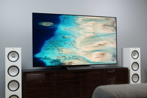 Island/Beach imagery on the TCL 6-Series model R648 screen.