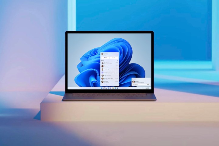 Laptop sitting on a desk showing Windows 11's built-in Microsoft Teams experience