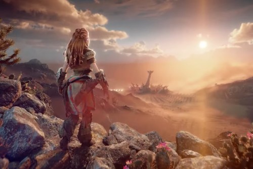 Aloy stands on a mountain in Horizon Forbidden West.