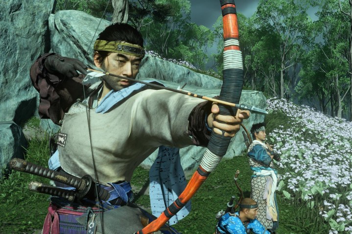 Jin draws back a bow in Ghost of Tsushima.