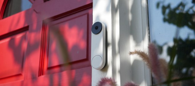 Google Nest Doorbell (battery) on outside of door.