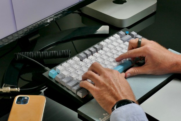 Typing on the Keychron Q1 mechanical keyboard.