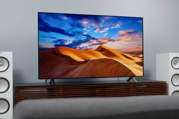 LG A1 OLED 4K HDR TV screen displaying imagery of a colorful desert.