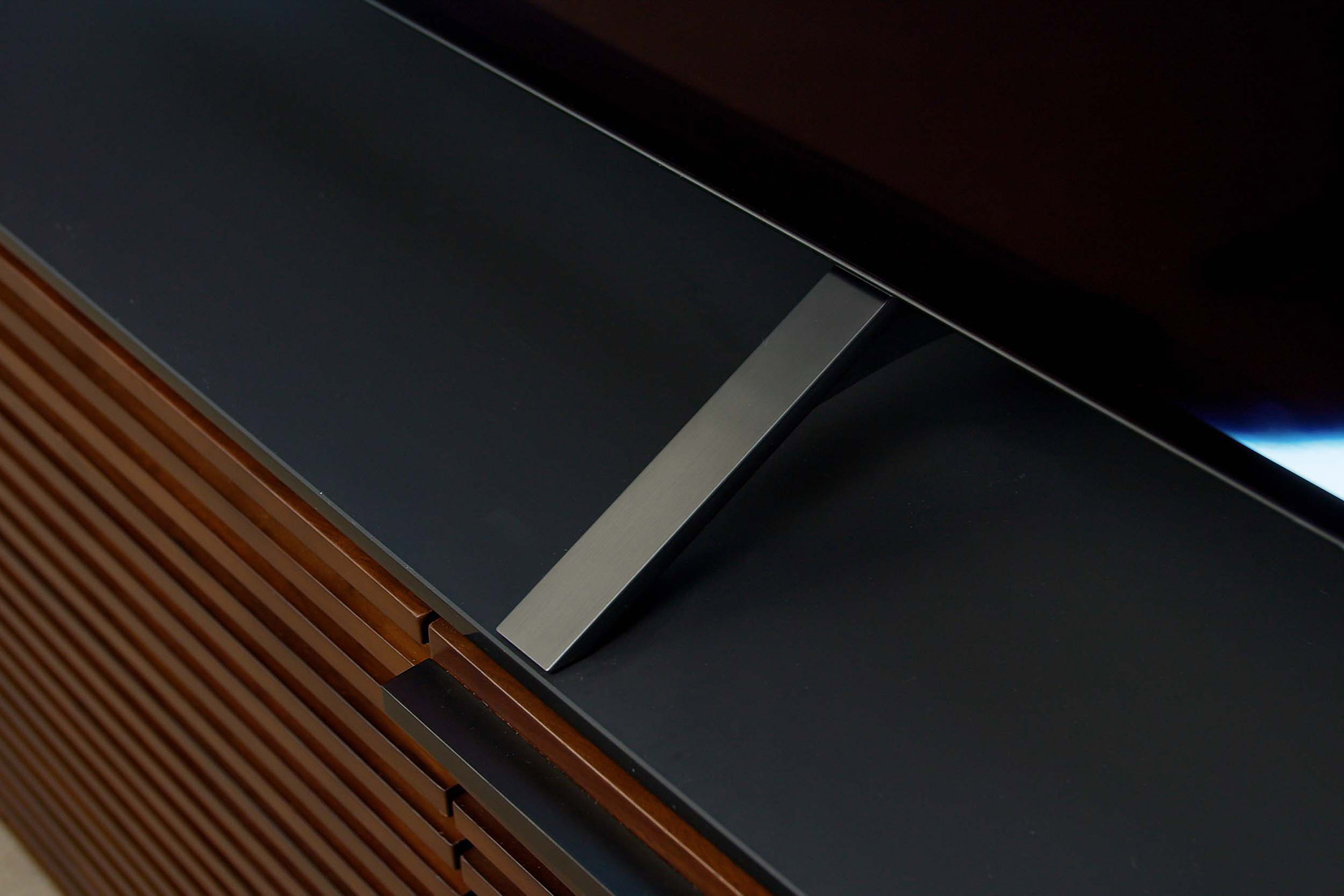 Close up image of the LG A1 OLED 4K HDR TV's stand