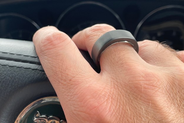 The Oura Ring on a finger, seen from the back.