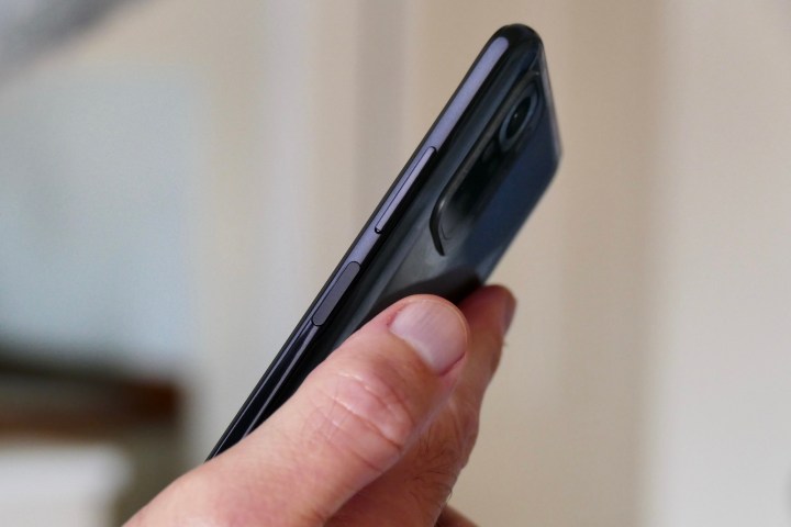 The fingerprint sensor on the Xiaomi Redmi Note 10S.