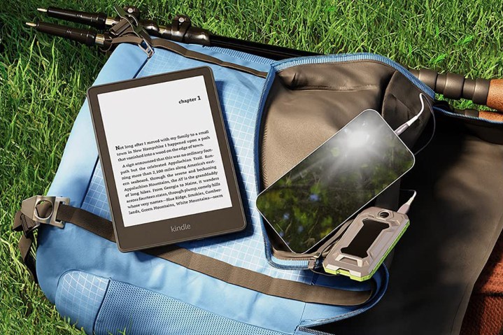 Kindle Paperwhite with camping gear.
