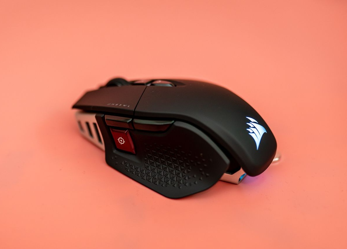 A side view of the Corsair M65 wireless mouse.
