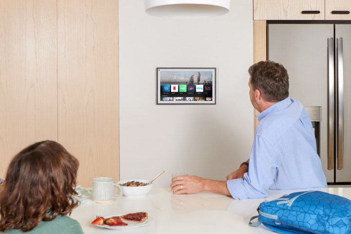 Amazon Echo Show 15 hanging horizontally on the wall in a kitchen.