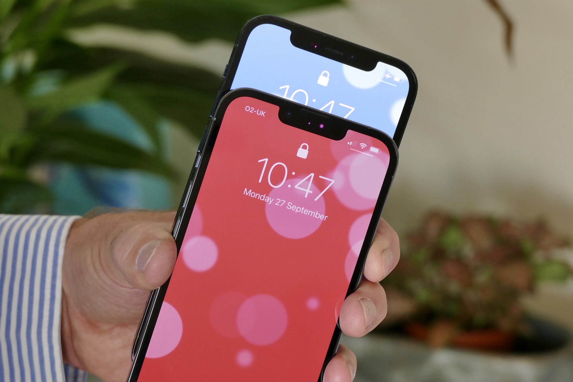 iPhone 13 Pro's smaller notch compared to the iPhone 12 Pro's larger notch.