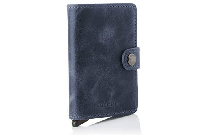 Secrid Mini Smart Wallet showing the worn leather finish and secure clasp.