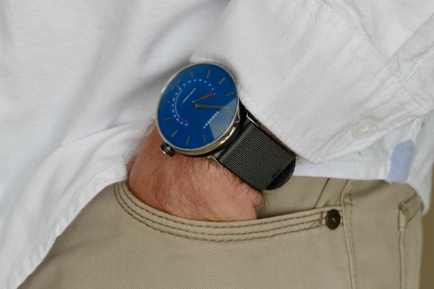 Sequent SuperCharger watch on a wrist with hand in pocket.