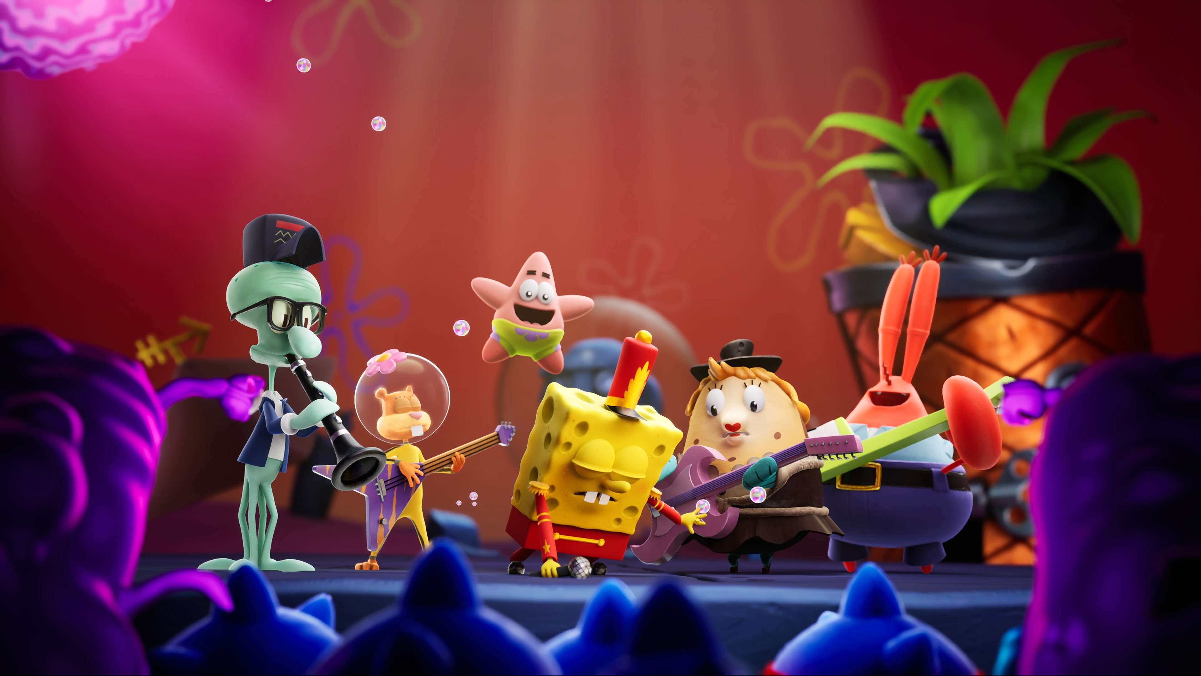 SpongeBob SquarePants y otros personajes actúan en una banda.