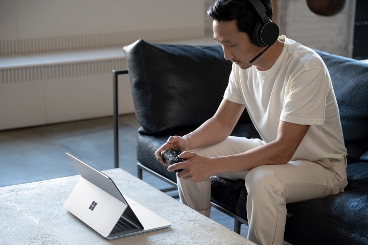 Someone gaming on a Surface Laptop Studio.