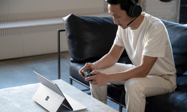 Someone gaming on a Surface Laptop Studio.