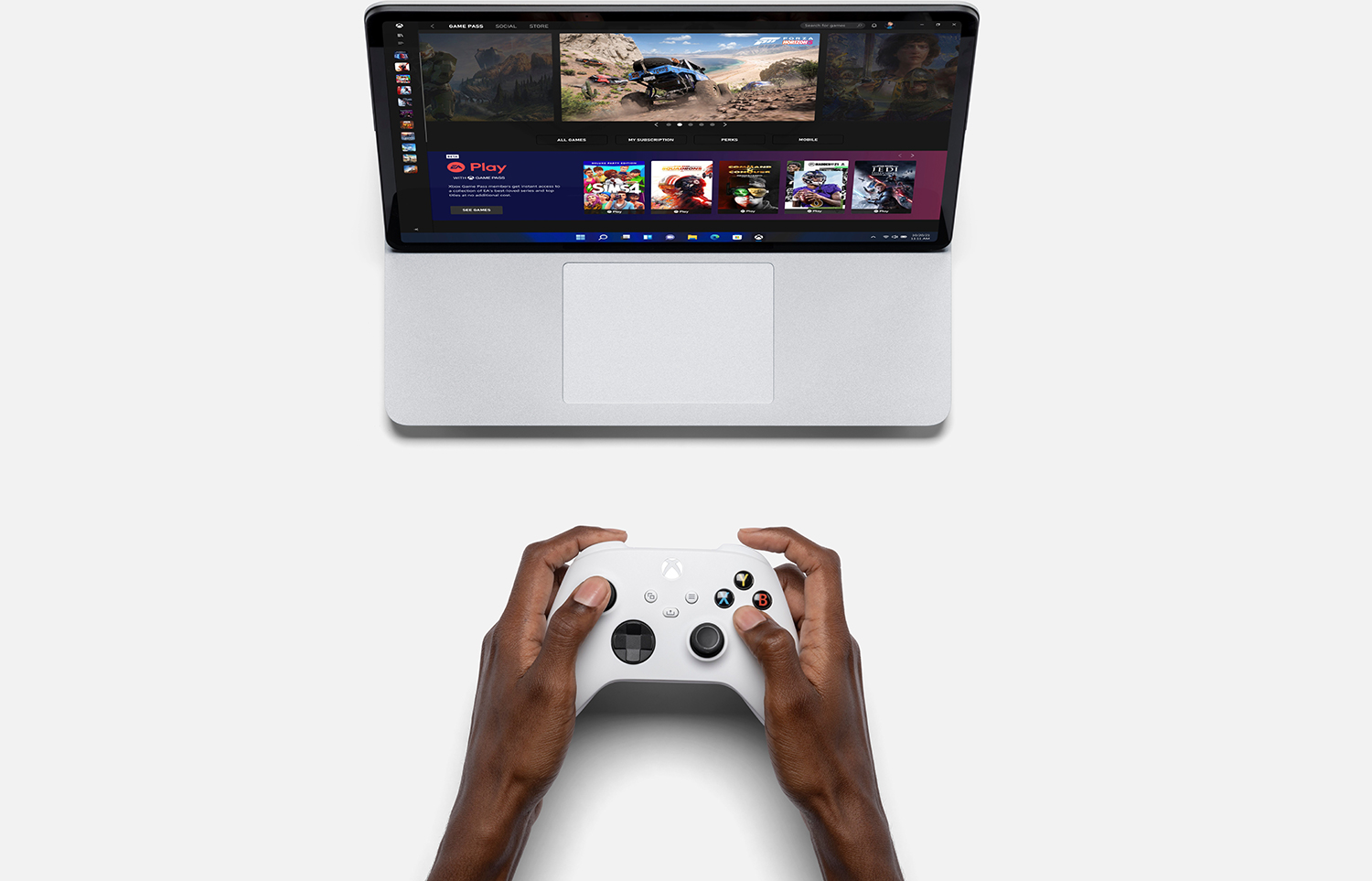 Someone playing Xbox on a Surface Laptop Studio.