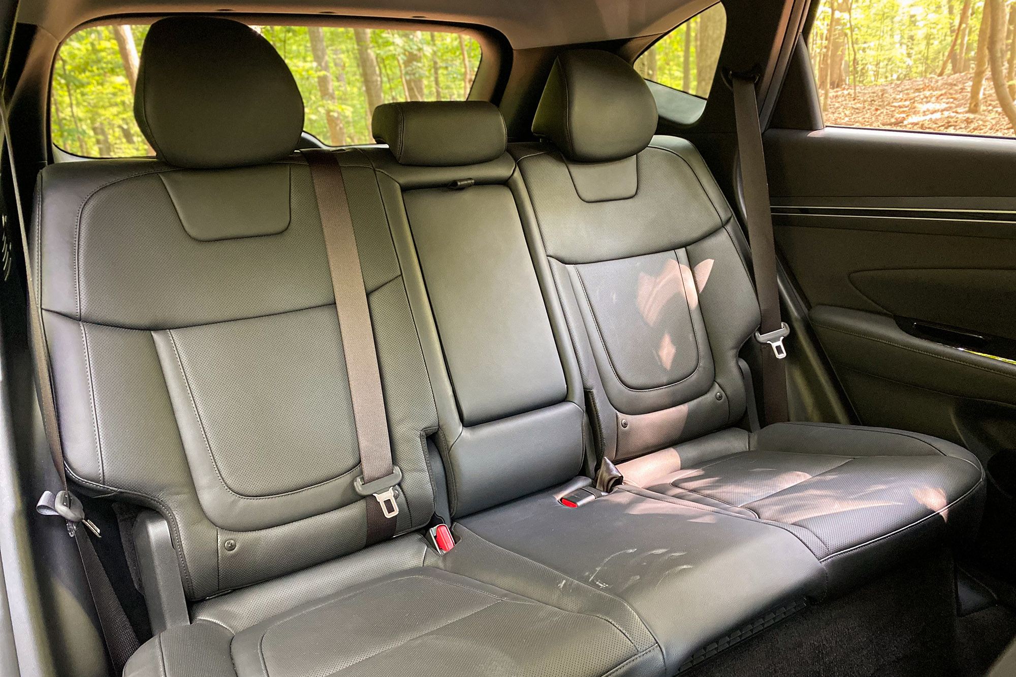 View of the 2022 Hyundai Tucson Hybrid Limited interior and back seats.