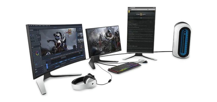 Alienware Aurora R12 gaming desktop alongside two monitors and a keyboard and headset.